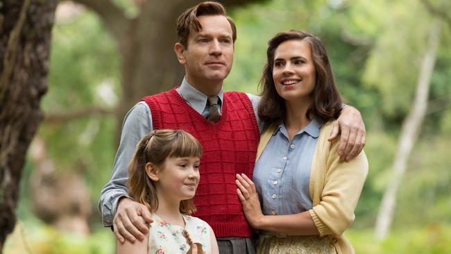 Bronte Carmichael (Madeline Robin), Ewan McGregor (Christopher Robin) and Hayley Atwell (Evelyn Robin) in the heartwarming <i>Christopher Robin</i>.