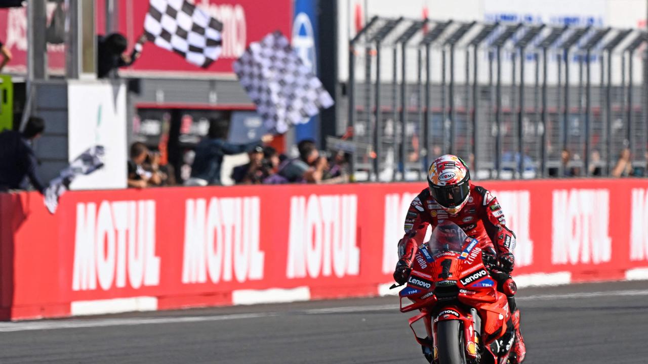 Bagnaia joined an elite group with an eighth Grand Prix victory in the same season. (Photo by Toshifumi KITAMURA / AFP)