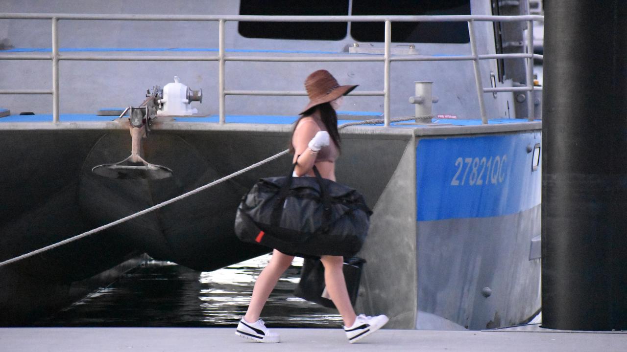 Hamilton Island visitors arrive on the mainland. Picture: Kirra Grimes