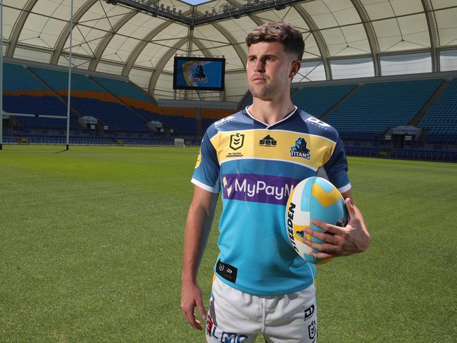 Toby Sexton models the Titans’ new jersey. Picture Glenn Hampson