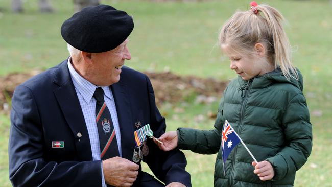 A tender moment after the dawn service. Picture: Andrew Henshaw