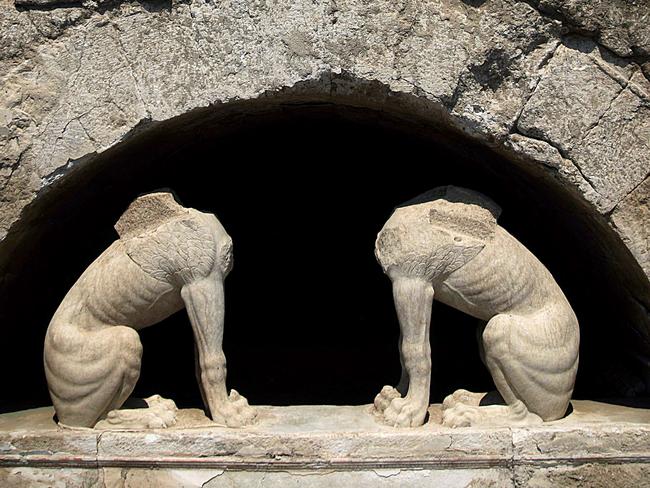 Guardians of the gate .... Two large stone sphinxes are seen under a barrel-vault topping the entrance to an ancient tomb under excavation at Amphipolis. Source: AP