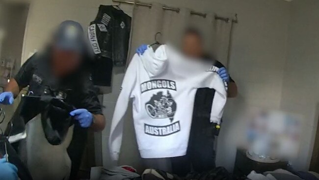 Police footage of a Mongols jumper found in a home during raids targeting alleged members and associates of the Mongols Outlaw Motorcycle Gang in Cairns.