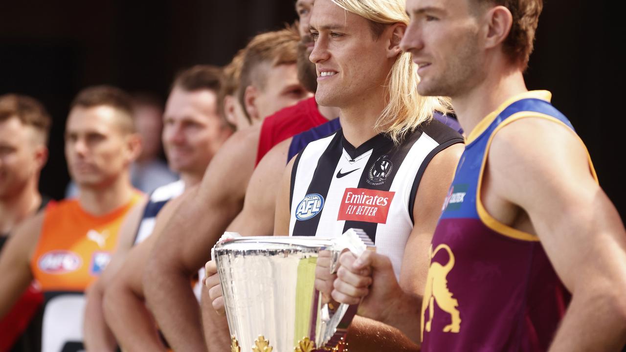 MELBOURNE, AUSTRALIA - FEBRUARY 26: Darcy Moore and of the Magpies and Harris Andrews of the Lions (R) pose for a photograph along side all captains during 2024 AFL Captain's Day at Marvel Stadium on February 26, 2024 in Melbourne, Australia. (Photo by Daniel Pockett/Getty Images)