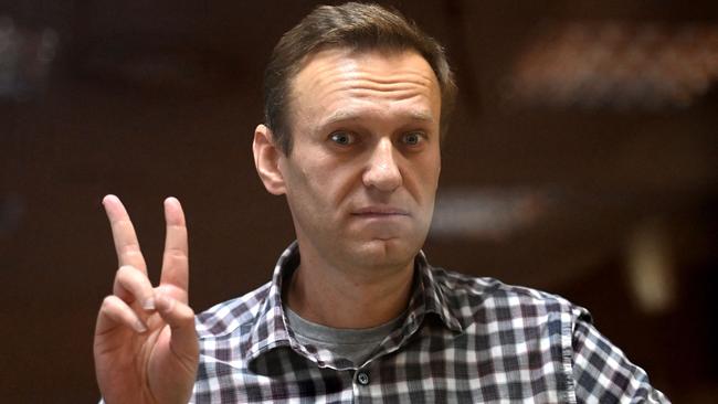 Alexei Navalny inside a glass cell during a court hearing in Moscow in March 2022. (Photo by Kirill Kudryavtsev/AFP.)