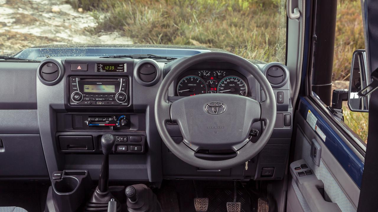 The LandCruiser’s entertainment tech consists of a CD player. Pics by Thomas Wielecki