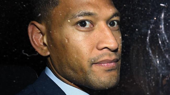 Wallabies star Israel Folau leaves a Code of Conduct hearing in Sydney, Tuesday, May 7, 2019. Folau appeared before a code of conduct hearing to fight Rugby Australia's decision to terminate his contract after he posted in mid-April on social media that gay people, along with other 'sinners' will face damnation unless they repent. (AAP Image/Joel Carrett) NO ARCHIVING