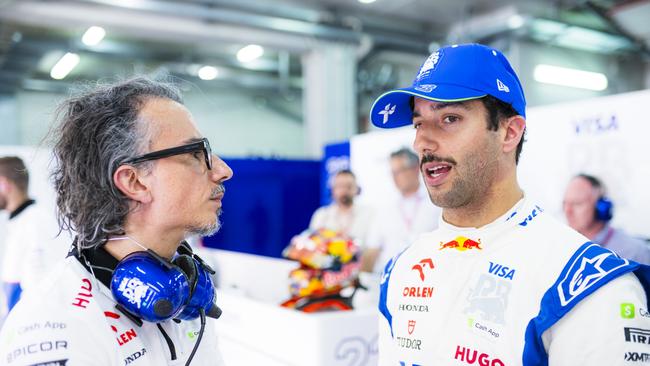 Laurent Mekies and Ricciardo talking in the garage. (Photo by Rudy Carezzevoli/Getty Images)