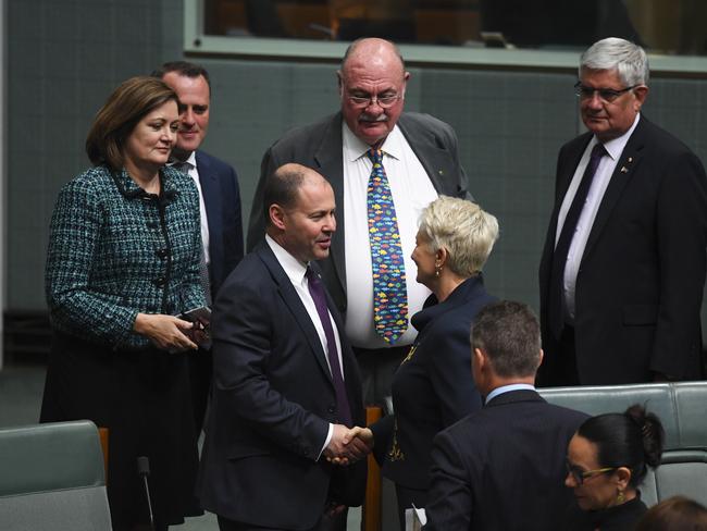 Newly-elected Independent MP for the seat of Wentworth Kerryn Phelps is congratulated by Josh Frydenberg and fellow Liberal MPs after her maiden speech.