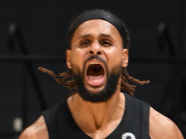 LOS ANGELES, CA - JANUARY 5: Patty Mills #8 of the San Antonio Spurs celebrates during the game against the LA Clippers on January 5, 2021 at STAPLES Center in Los Angeles, California. NOTE TO USER: User expressly acknowledges and agrees that, by downloading and/or using this Photograph, user is consenting to the terms and conditions of the Getty Images License Agreement. Mandatory Copyright Notice: Copyright 2021 NBAE (Photo by Adam Pantozzi/NBAE via Getty Images)