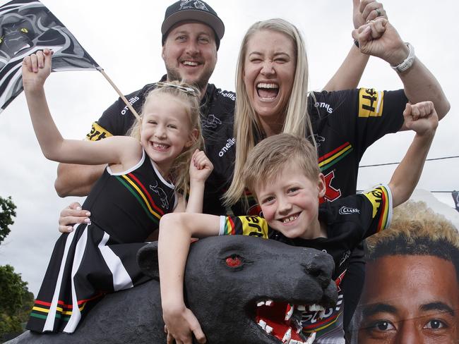 DAILY TELEGRAPH September 29, 2022.Footy fans, Amy and Ben Christie, pictured with their kids Matilda, 6 and Charlie 8 have a large concrete panther in their front yard and are excited for the Grand Final on the weekend. Picture: David Swift