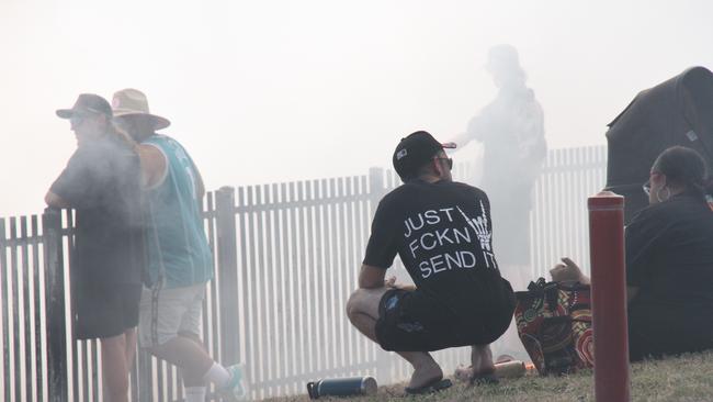 Punters watching on the smoke. Picture: Gera Kazakov