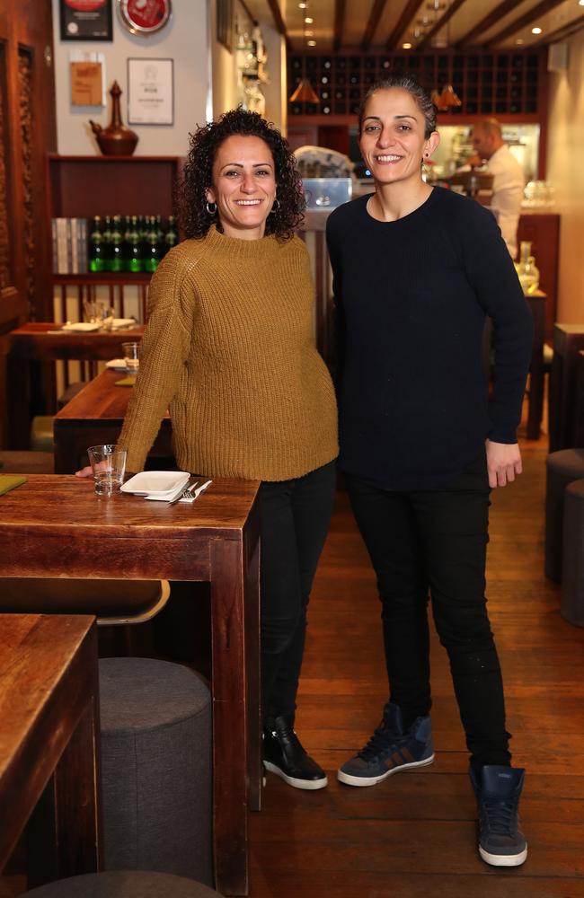 Sisters Carol and Sharon Salloum who have dumped UberEats and Deliveroo from their restaurant Almond Bar in Darlinghurst. Picture: Brett Costello