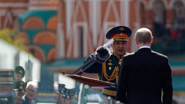 Russian Defence Minister Sergei Shoigu salutes President Vladimir Putin during the Victory Day military parade on May 9. Picture: Sputnik/ AFP