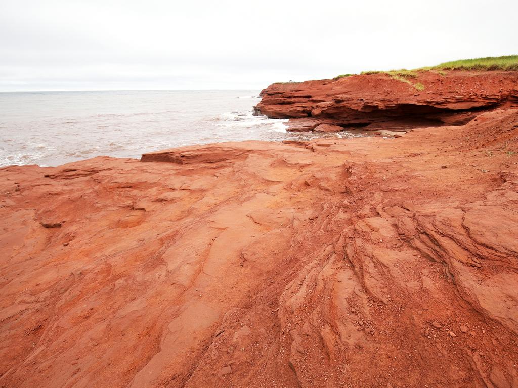 <span>14/20</span><h2>Red Sands Shore, Prince Edward Island</h2><p>Thanks to high iron content in the soil, <a href="https://www.tourismpei.com/red-sands-shore" target="_blank">parts of Prince Edward Island’s coastline </a>are emblazoned with red sandstone cliffs, red clay roads and rose-tinted sand beaches. Cavendish Beach is a popular hangout for beachgoers, who can walk around the vibrant cliffs or just take in the views from the shoreline.</p>