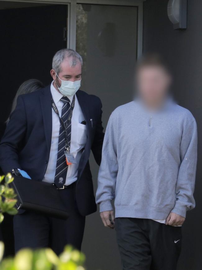 Finch being arrested at his home and taken to Kogarah Police Station.