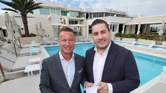 Richard Crawford, Vice President of Hotel Development for Australia, New Zealand and Pacific, Marriott International and Jason Makris CEO, Makris Group, agree to terms for the Australian mainland’s first Marriott luxury resort to be built on The Spit at Marina Mirage on the Gold Coast. Picture Glenn Hampson
