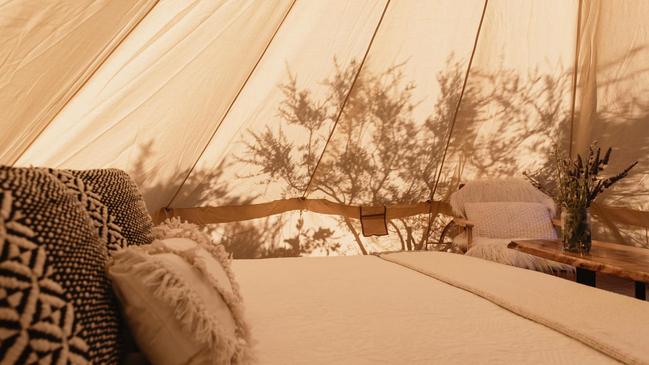 Little Beach Co.’s comfy bell tents complete with plush bed and stylish furnishings.