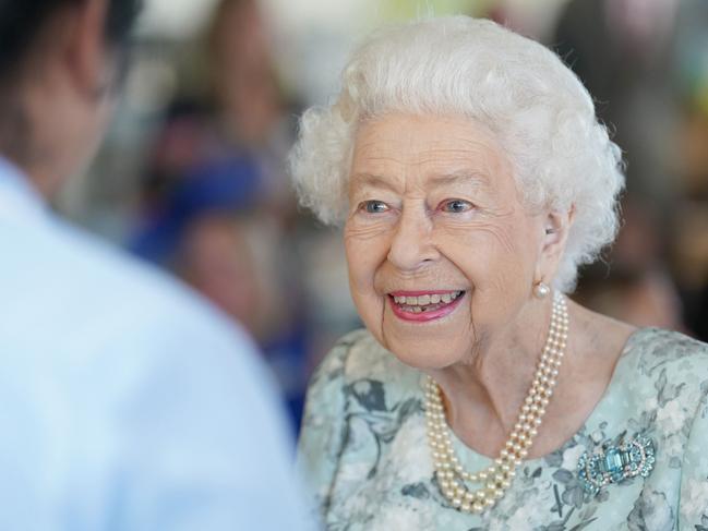 Britain's Queen Elizabeth II smiles during a visit to officially open a new building at Thames Hospice in Maidenhead, Berkshire, on July 15, 2022. (Photo by Kirsty O'Connor / POOL / AFP)