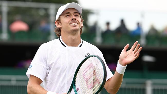 Australia's Alex De Minaur celebrates winning against Australia's James Duckworth during their men's singles tennis match on the second day of the 2024 Wimbledon Championships at The All England Lawn Tennis and Croquet Club in Wimbledon, southwest London, on July 2, 2024. De Minaur won the match 7-6, 7-6, 7-6. (Photo by HENRY NICHOLLS / AFP) / RESTRICTED TO EDITORIAL USE