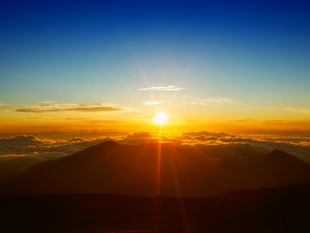 Few things are more romantic than watching the sunrise on Mount Haleakala.