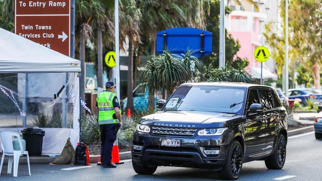 Police at the border checkpoint between Coolangatta and Tweed Heads. Picture: Nigel Hallett.