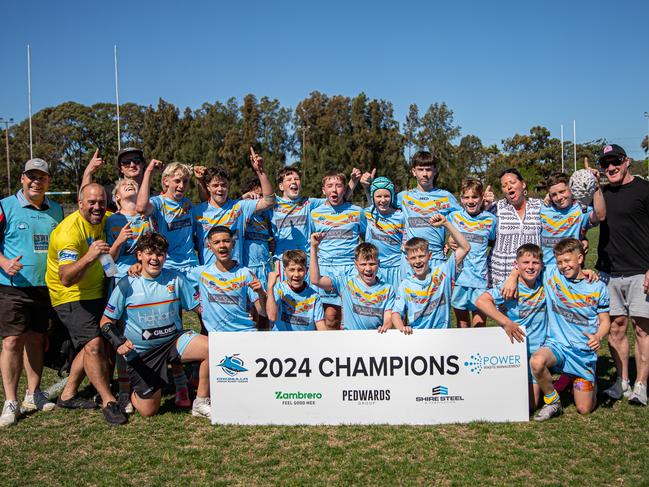 De La Salle Caringbah celebrate their 2024 grand final victory - former Sharks premiership winner and coach, Paul Gallen, far right. Picture: Adam Wrightson