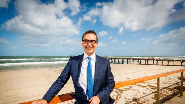 SA Liberal leader Steven Marshall after his victory in the state election poses at Henley Beach.