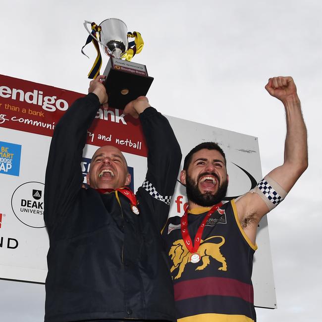 Buckle lifts the 2018 Division 2 cup. Picture: AAP/James Ross