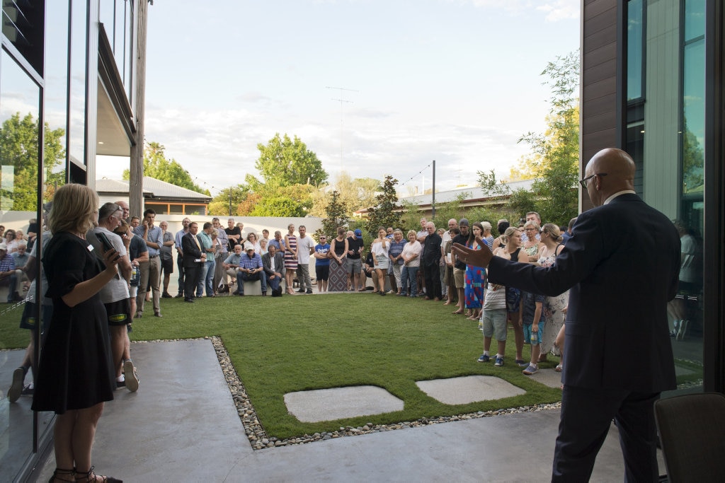 The crowd listen to final instructions from auctioneer Phil Parker as 37 Arthur St goes under the hammer, Saturday, November 12, 2016. Picture: Kevin Farmer