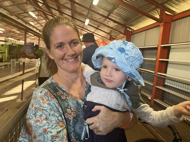 Kylie and Kayden Sutherland looking at the birds at the Fraser Coast Show.