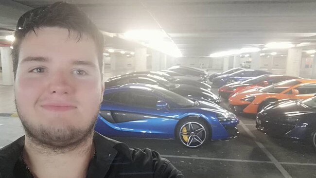 Ward in a selfie with luxury cars in the background. Picture: Instagram