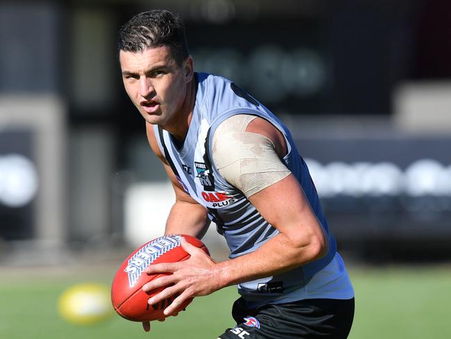 Tom Rockliff of the Power is seen during a training session at Alberton Oval in Adelaide, Tuesday, April 2, 2019. (AAP Image/David Mariuz) NO ARCHIVING