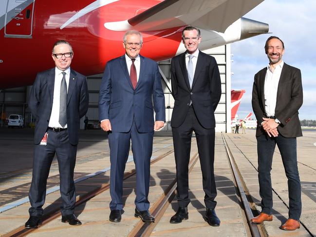 Alan Joyce, CEO of Qantas, Prime Minister Scott Morrison, New South Wales premier Dominic Perrottet, and Gareth Evans, CEO of Jetstar at the announcement to resume flights on Friday. Picture: James D. Morgan