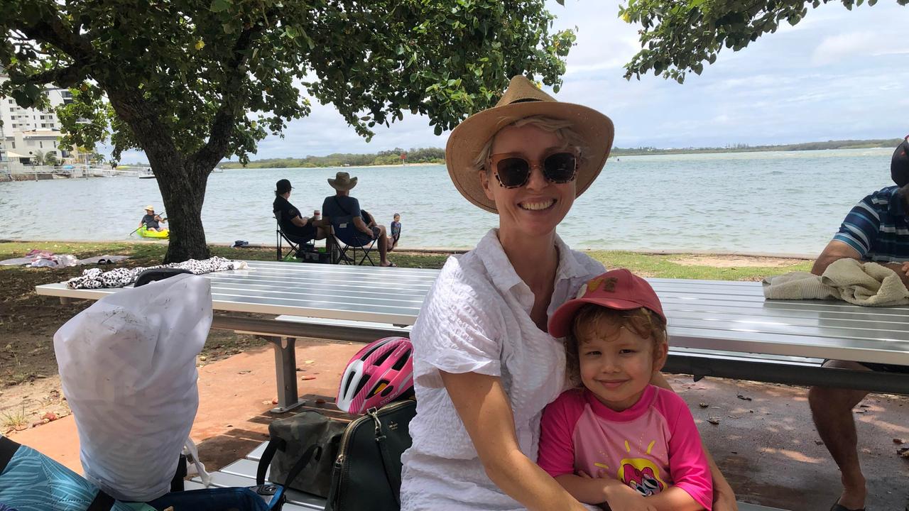 Katie Moore and Brooklyn Zamani enjoy Christmas celebrations at Cotton Tree Park. Picture: Laura Pettigrew.