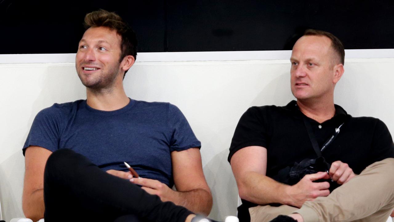 Ian Thorpe and Daniel Kowalski on pool deck at the 2015 Australian Swimming Championships at Homebush Aquatic Center.