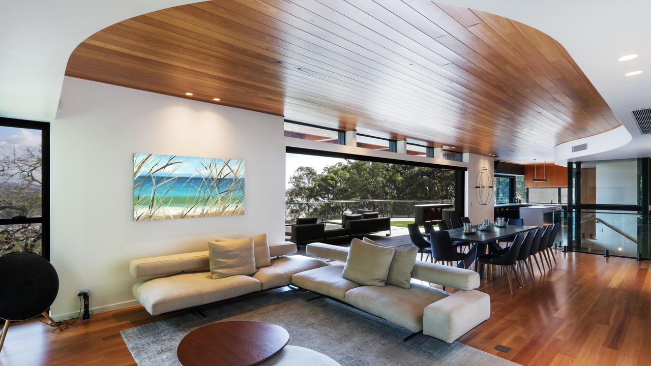 Timber-lined ceilings and floors inside the architectural home