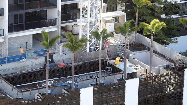 The cable of a crane opperating at QUBE Broadbeach snapped this afternoon. About half of the cable landed in the yet to be completed swimming pool. Photo by Richard Gosling