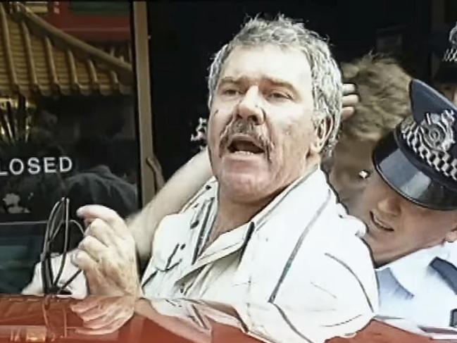 A still from Seven News showing the arrest of Jack Karlson.