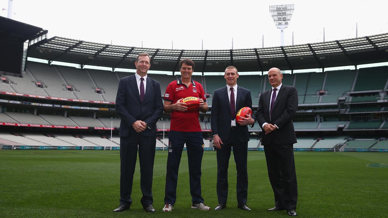 MELBOURNE, AUSTRALIA - SEPTEMBER 18: Peter Jackson club CEO, coach Paul Roos, assistant coach Simon Goodwin and club President Glen Bartlett pose for the media after a Melbourne Demons AFL press conference at Melbourne Cricket Ground on September 18, 2014 in Melbourne, Australia. (Photo by Robert Cianflone/Getty Images)