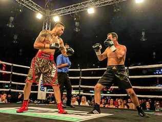 WIN: Adam Stowe (right) knocked out his opponent, Brisbane boxer Timani Taupau, in the third round of Kingscliff Boxing Stables' international event Boxing Mania 2. Picture: Contributed