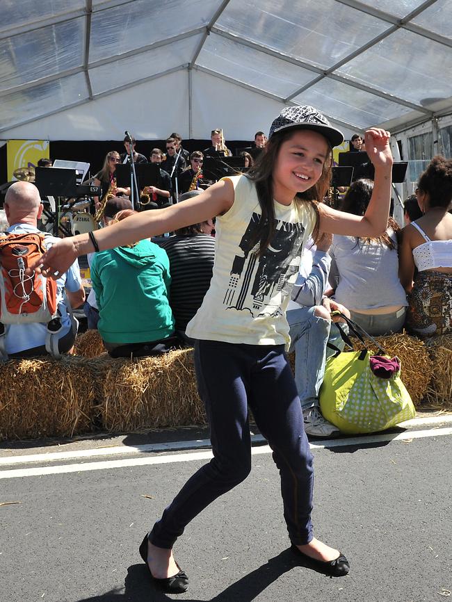 Elle Bekis of Manly, 10, enjoying a boogie at the school band stage at the Manly Jazz festival in 2011. Picture: Martin Lange