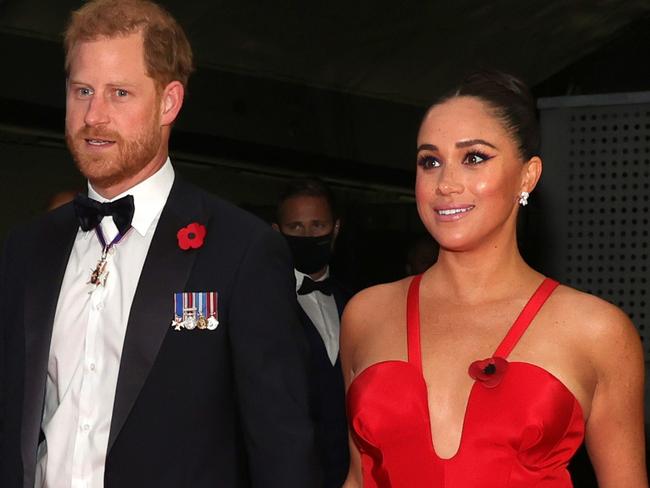 Meghan stuns in plunging red gown with Harry