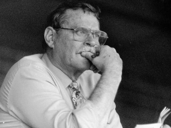 Sydney Swans coach-elect Ron Barassi watches the Brett Scott-coached Swans in commentary.