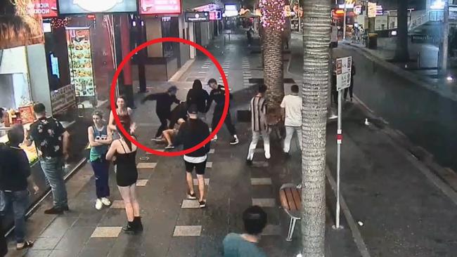 Ivan Susin, 29, can be seen throwing a punch after intervening, before he is knocked out cold. Gold Coast Surfers Paradise fight assault. Picture: 9News