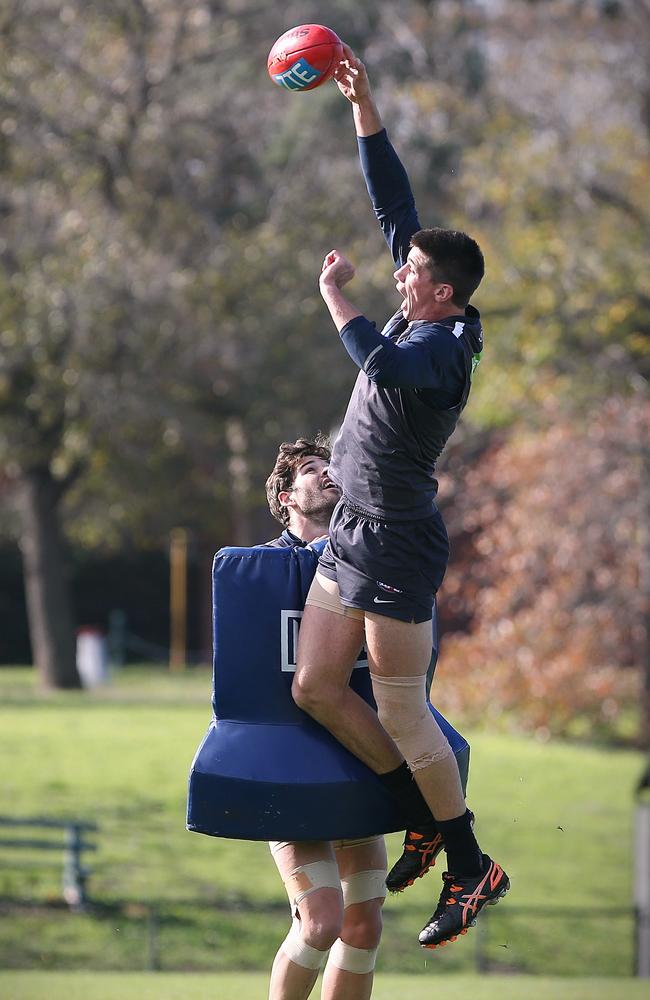 Levi Casboult helps Matthew Kreuzer with some tap work. Picture: Wayne Ludbey