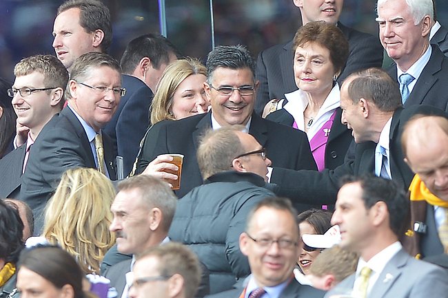 Prime Minister Tony Abbott, Victorian Premier Denis Napthine and AFL CEO Andrew Demetriou enjoy a beer during the AFL Grand Final. Picture: Tim Carrafa