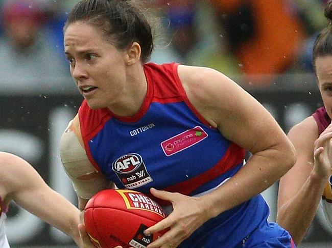 Emma Kearney of the Bulldogs runs forward during the AFLW grand final match between the Western Bulldogs and the Brisbane Lions at Ikon Park in Melbourne, Saturday, March 24, 2018. (AAP Image/Hamish Blair) NO ARCHIVING, EDITORIAL USE ONLY