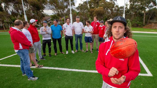 Fish Creek captain Brent Cooper with club teammates and officials. Picture: Mark Stewart