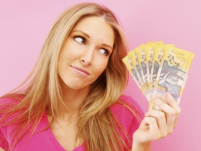 Woman with cash. Picture: iStock